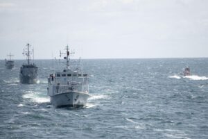 Ships assigned to SNMCMG1 performing a simulated attack exercise in the Baltic Sea during BALTOPS25. Image: MARCOM.