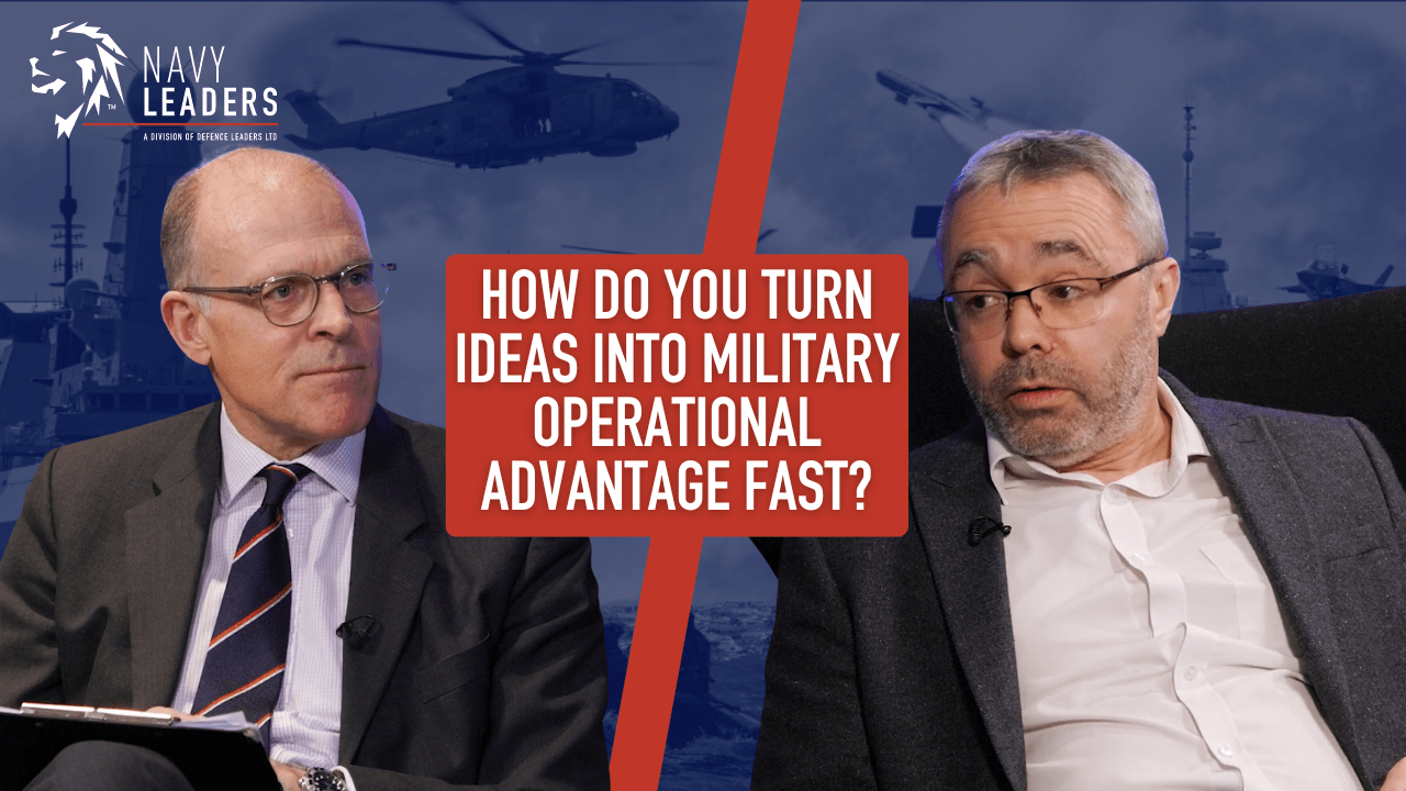 Two men in suits sit against a navy-themed background. A text in the center reads, "How do you turn ideas into military operational advantage fast?" The tone is serious and professional.