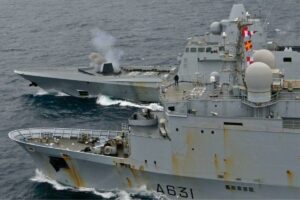 French FREMM frigate Auvergne firing her 76mm cannon at an aerial threat during a replenishment exercise: Image: French Navy