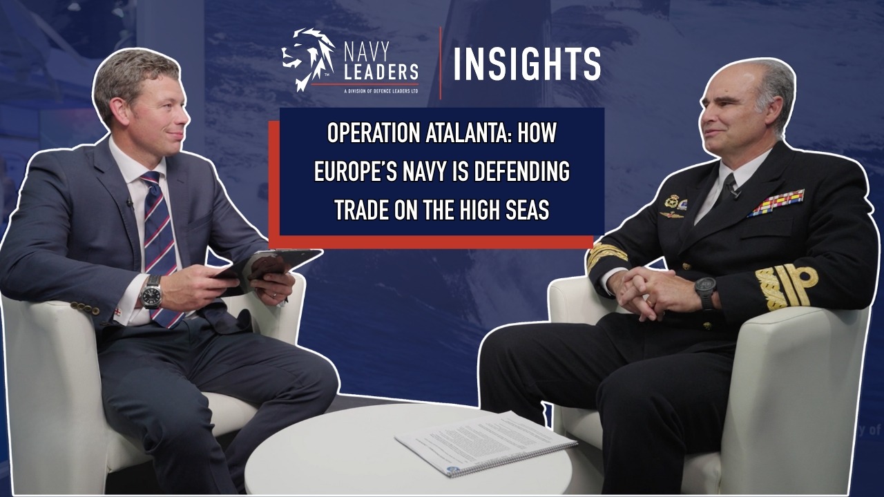 Video Thumbnail for "Operation Atalanta: How Europe’s Navy Is Defending Trade on the High Seas". The image features two men, one in a suit, the other in a naval uniform facing each other for an interview