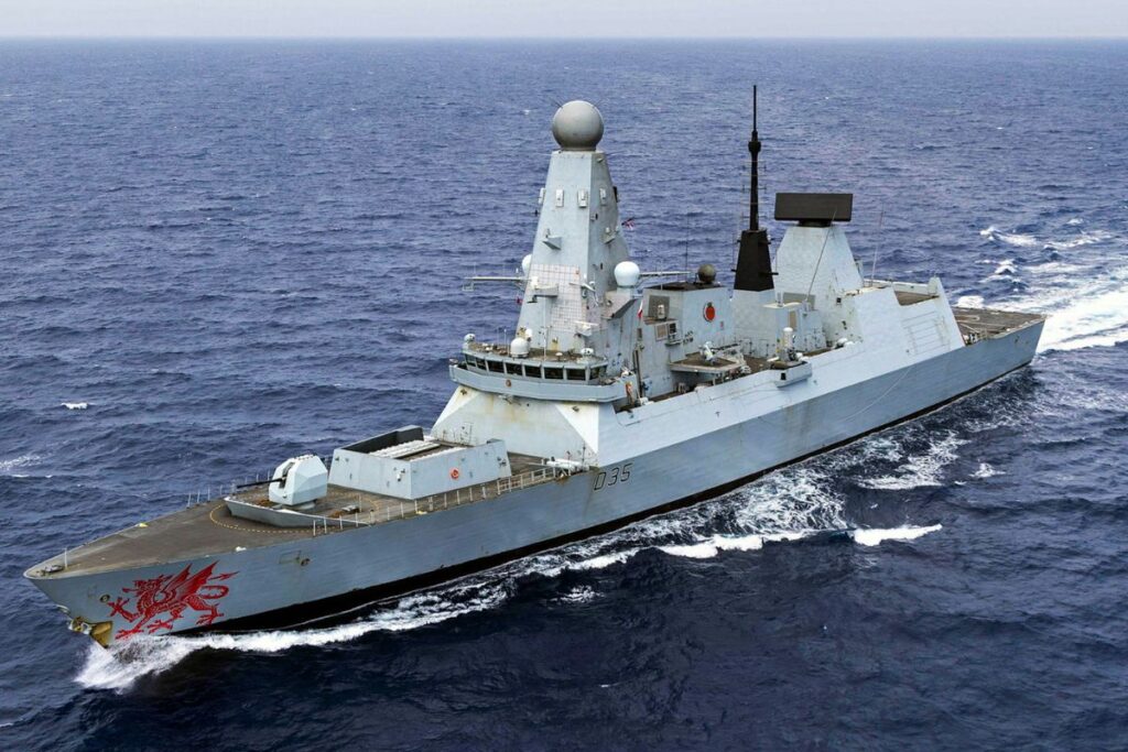 HMS Dragon carrying out high-speed manoeuvres in the eastern Mediterranean, as seen from a Wildcat Helicopter.