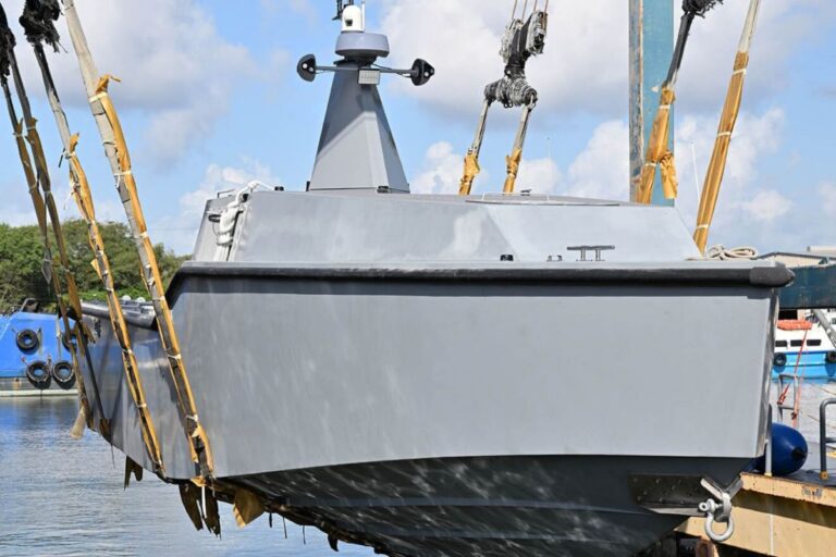 Saronic’s first Mirage USV being lowered into the water at its testing facility in Galveston, Texas.
