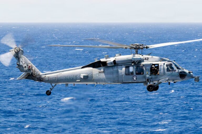 A U.S. Navy MH-60S Seahawk about to land on the flight deck of Nimitz-class aircraft carrier USS Theodore Roosevelt during Exercise Rim of the Pacific 2026.