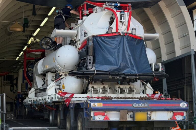 The Submarine Rescue Vehicle being loaded onto a simulator mimicking a C-17A Globemaster aircraft at RAF Brize Norton.