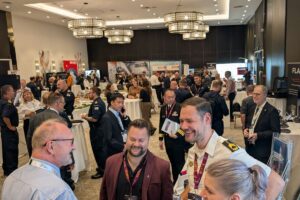 All smiles — delegates in the NDC 2026 exhibition area.