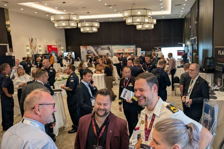 All smiles — delegates in the NDC 2026 exhibition area.
