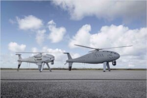 Schiebel’s S-300 uncrewed aerial system (right), pictured here alongside a sister S-100 UAS platform, has carried out its first U.K. flight.