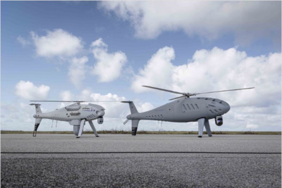 Schiebel’s S-300 uncrewed aerial system (right), pictured here alongside a sister S-100 UAS platform, has carried out its first U.K. flight.