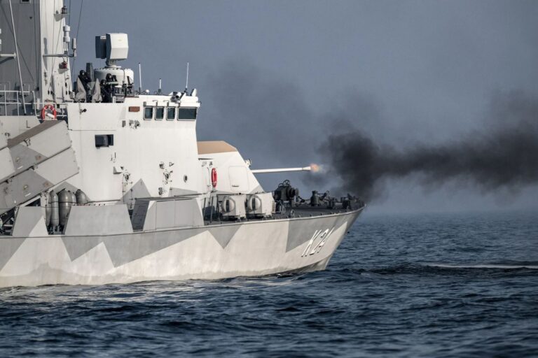 Royal Swedish Navy Göteborg-class missile corvette HMS Sundsvall firing its 57mm naval general-purpose gun.
