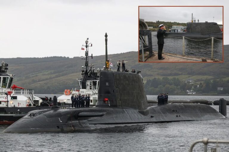 HMS Agamemnon, the sixth Royal Navy Astute-class hunter-killer submarine, is saluted (inset) as she arrives at her homeport, HMNB Clyde.