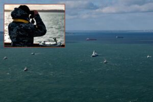 The five Ukrainian minehunters sailing in formation with Royal Navy Type 45 destroyer HMS Dauntless; inset, a Ukranian sailor looks across the Solent.