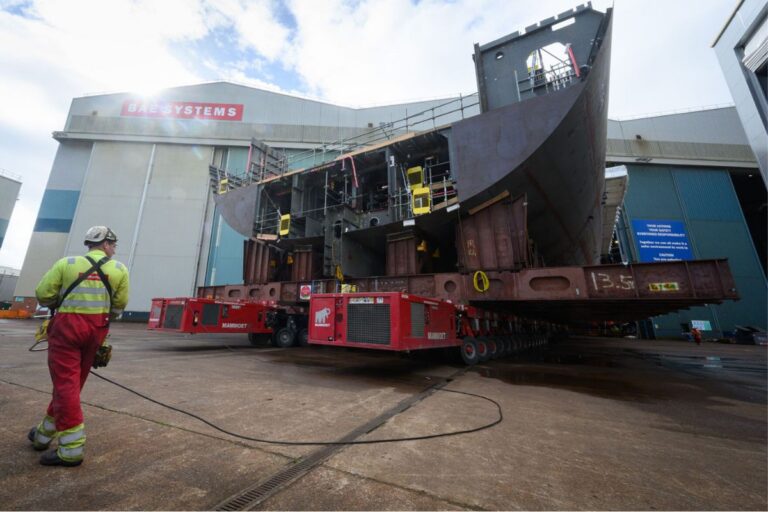 The aft block of the future HMS Sheffield is manoeuvred towards the paint hall at BAE Systems’ shipyard in Govan.