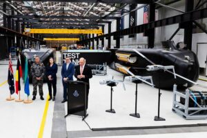 CEO of Anduril Australia David Goodrich speaking at the Anduril Australia factory in Sydney, New South Wales, watched by Defence Industry minister Pat Conroy, Chief of Navy, V.Adm. Matthew Buckley and Chief Defence Scientist Prof. Tanya Monro AC.