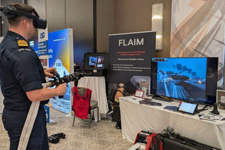 Just like the real thing? A Royal Navy officer tries his hand at some mixed reality virtual firefighting at NDC 2026.