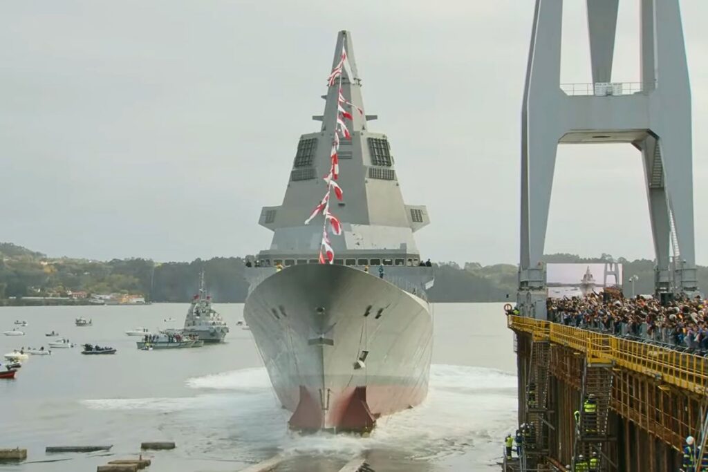 A still from footage of F112 frigate Roger de Lauria sliding into the water for the first time at the Ferrol shipyard in A Coruña.