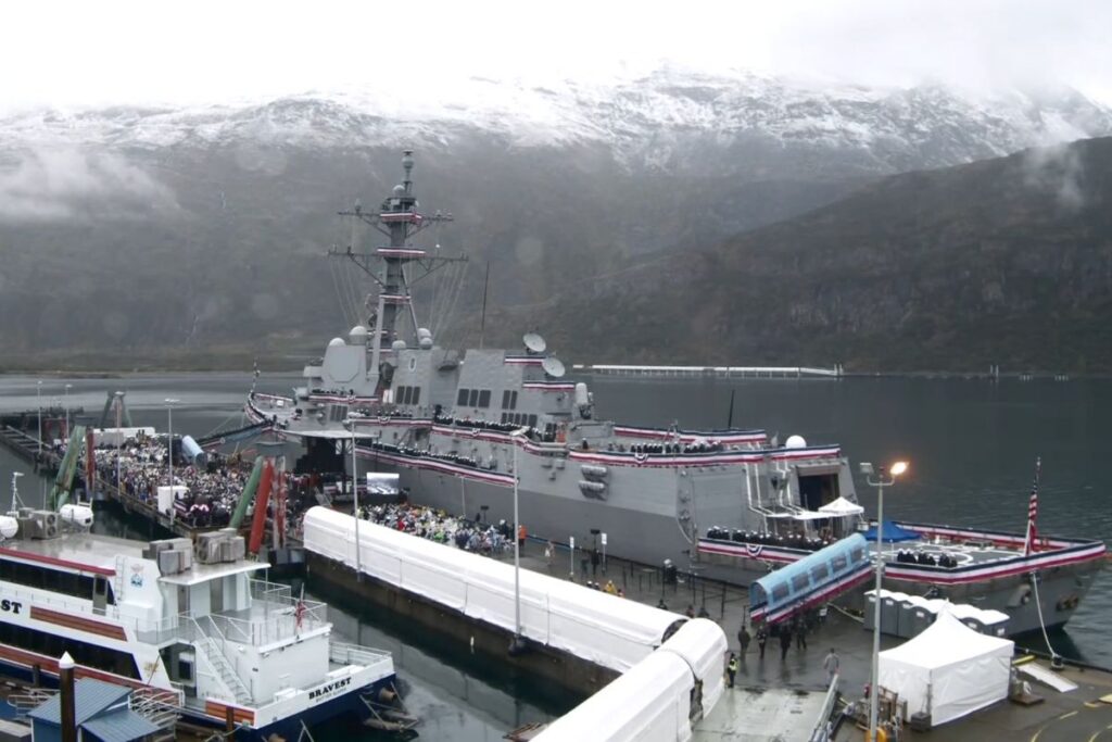 A still of video footage from the commissioning ceremony of Flight III Arleigh Burke-class destroyer USS Ted Stevens.