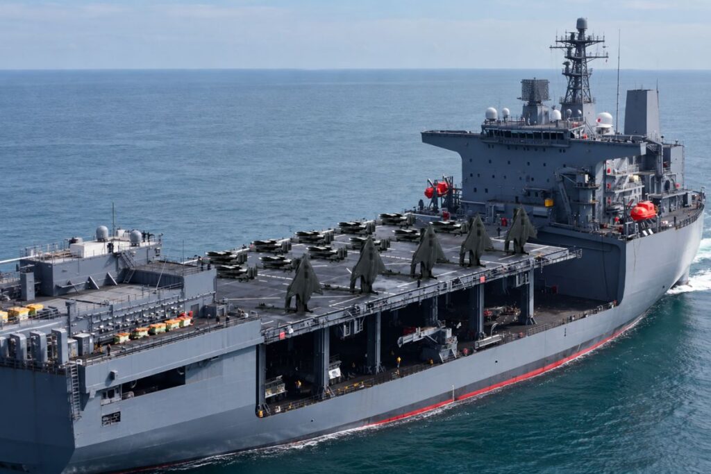 An AI-generated impression of X-BAT VTOL uncrewed fighter aircraft deployed on an amphibious assault ship.